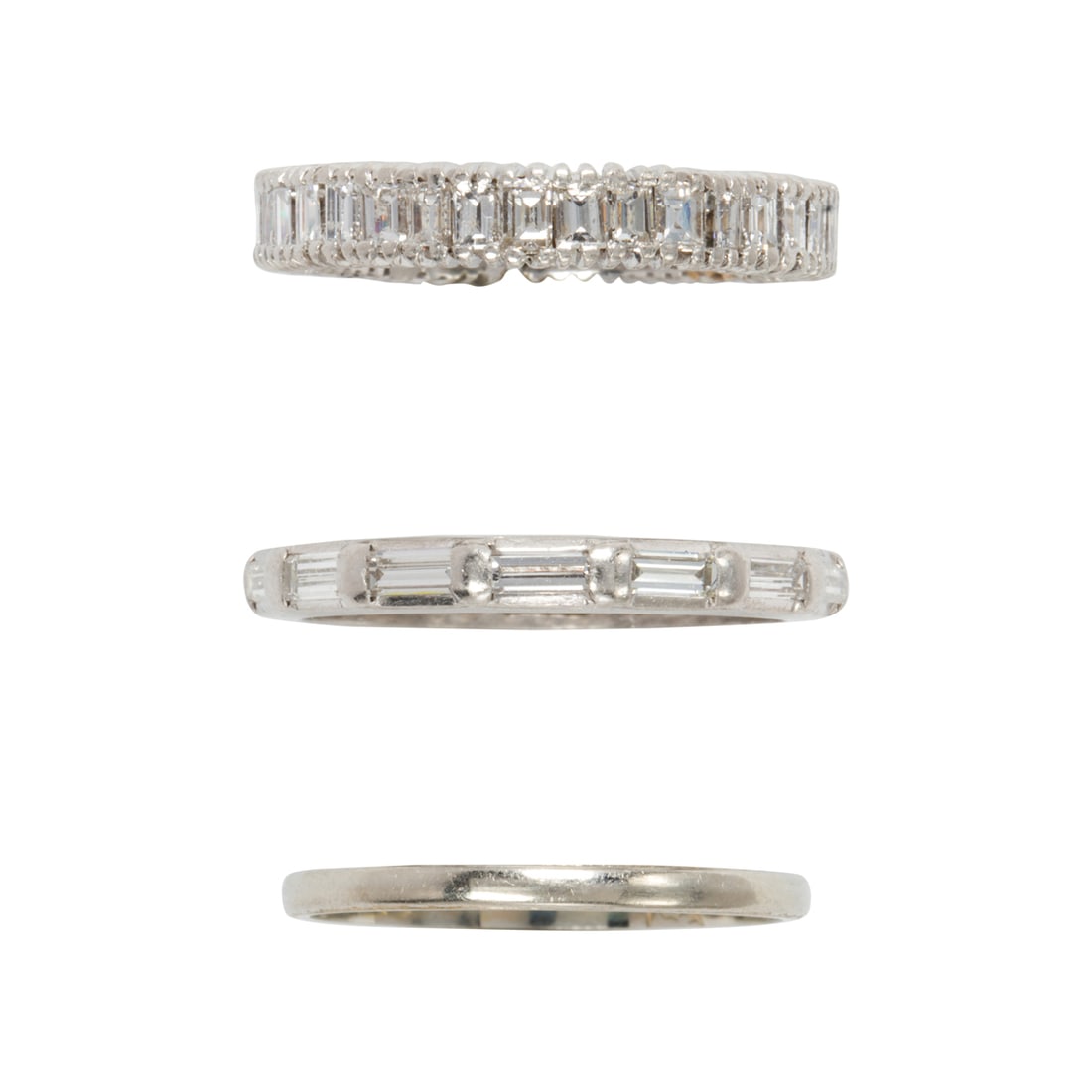Two diamond and platinum rings and one 14k white gold ring (1 of 2)