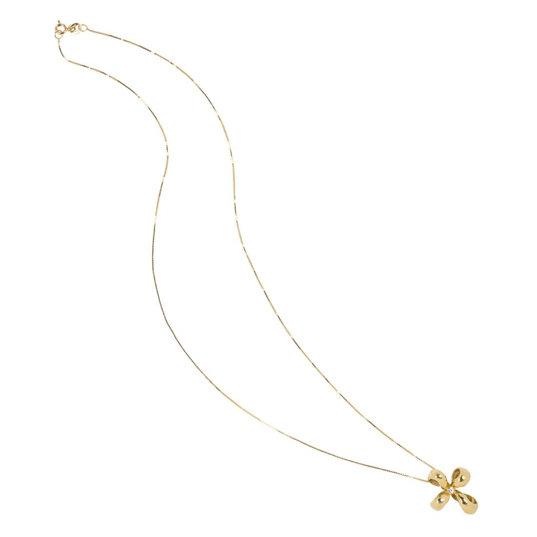 A diamond and 18k gold cross pendant with 14k gold chain: A diamond and 18k gold cross pendant with 14k gold chainThe dimensional loop cross accented by a round brilliant-cut diamond; 6.1 grams; pendant length: 3/4 in, chain length: 18 in