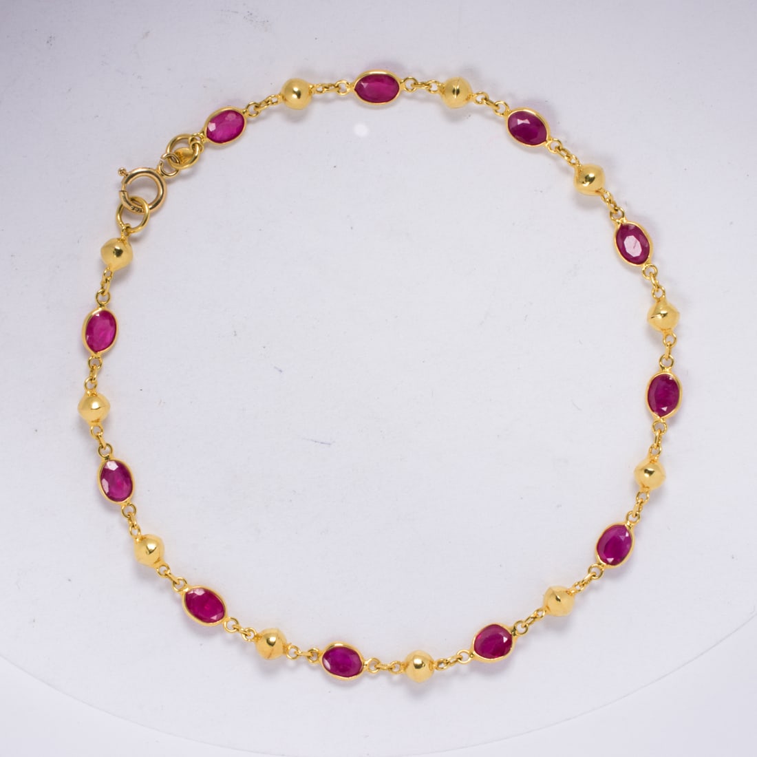 A ruby and 18k gold bracelet (1 of 2)