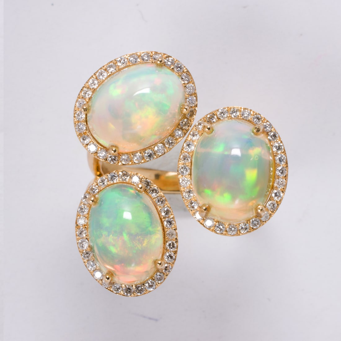 An opal, diamond, and 18k gold ring (1 of 2)