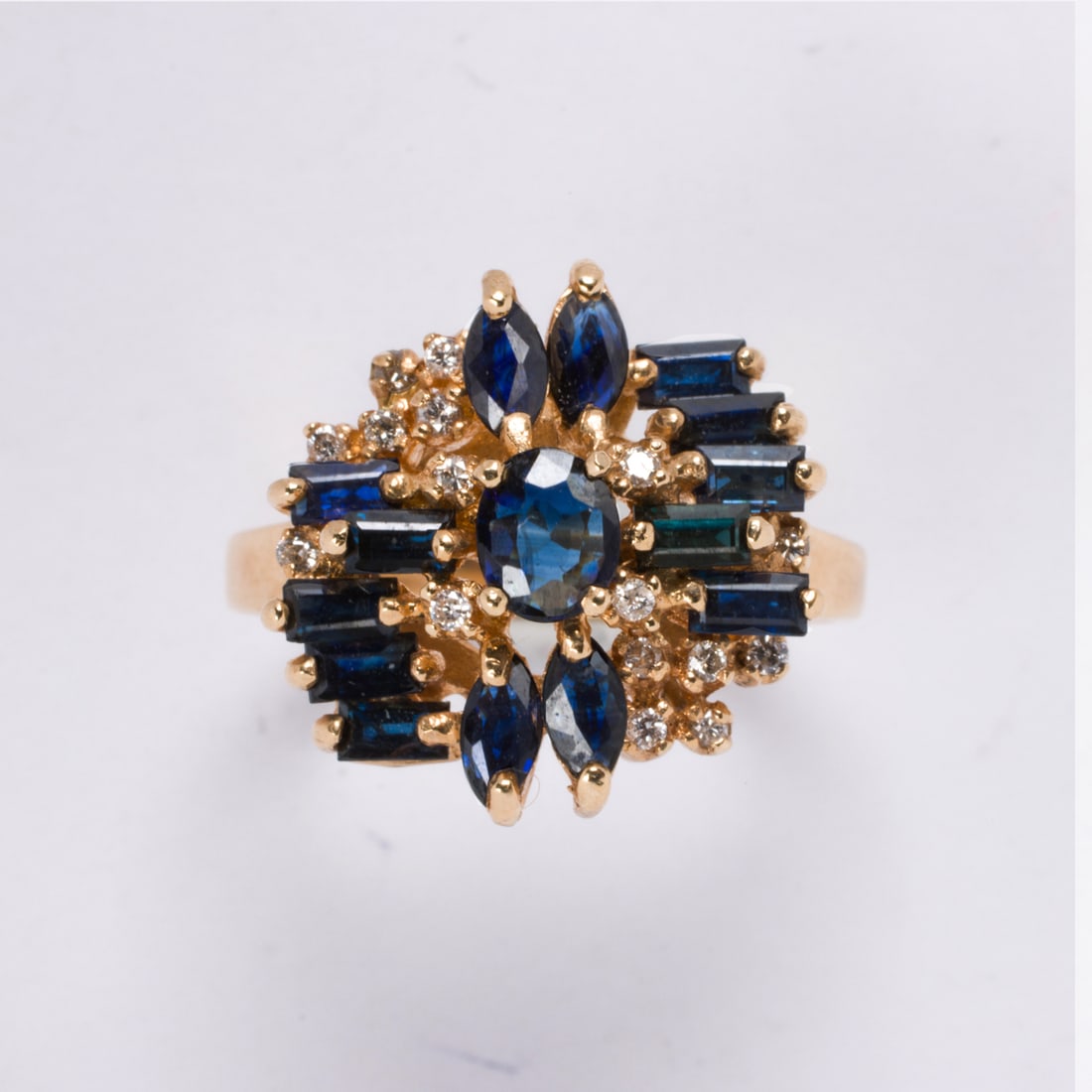 A sapphire, diamond, and 14k gold ring (1 of 2)