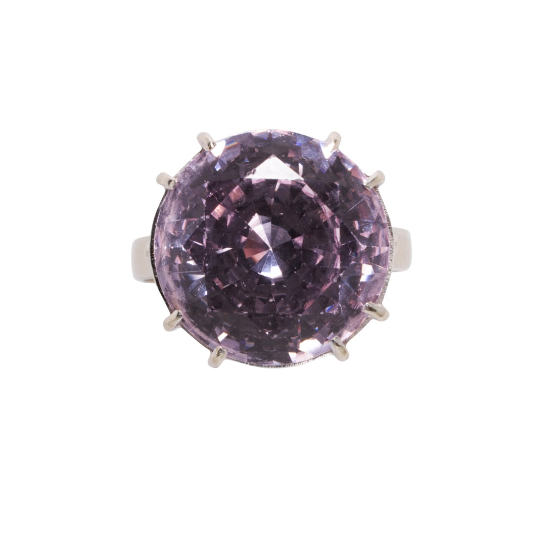 A kunzite and 18k white gold ring: A kunzite and 18k white gold ringCentering a round-cut kunzite measuring approximately 14.13 x 14.13 x 8.32 mm, set within 18k white gold; size 5; 5.70 grams