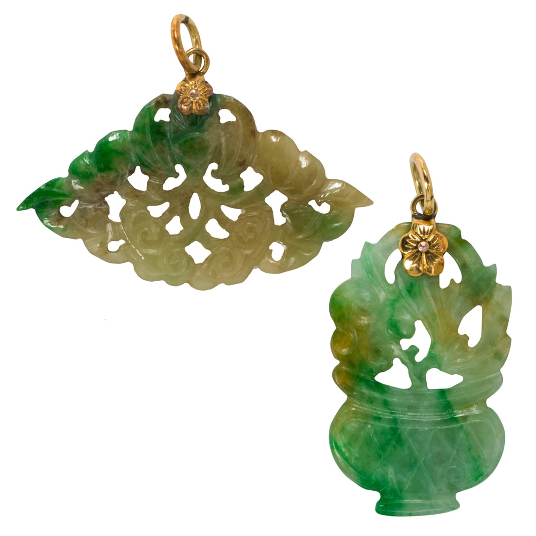 Two jade and 10k gold pendants: Two jade and 10k gold pendantsOf open-form design, one depicting a vessel of flowers and one depicting a bat, set with 10k gold bails; lengths: 1 1/4 in and 1 in, respectively; gross weight: 4.05