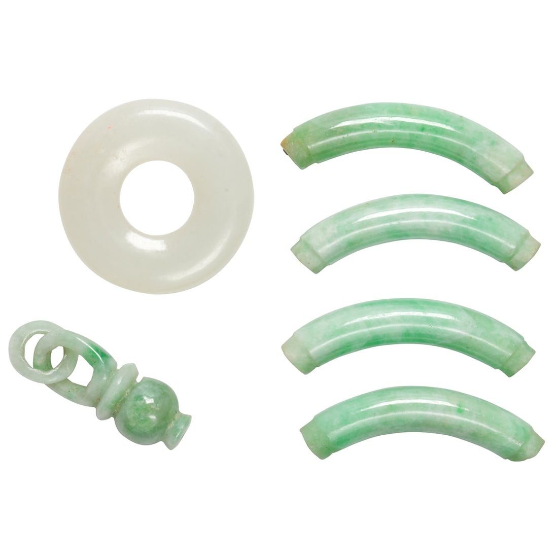 A group of miscellaneous jade pieces: A group of miscellaneous jade piecesComprising six miscellaneous jade pieces including a disc and hinge; gross weight: 17.35 grams