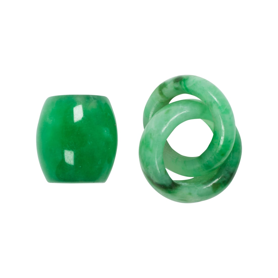 A jade bead and links: A jade bead and linksComprising one jade bead and one set of linked jade rings; lengths: 3/8 and 7/8 in, respectively; gross weight: 3.75 grams