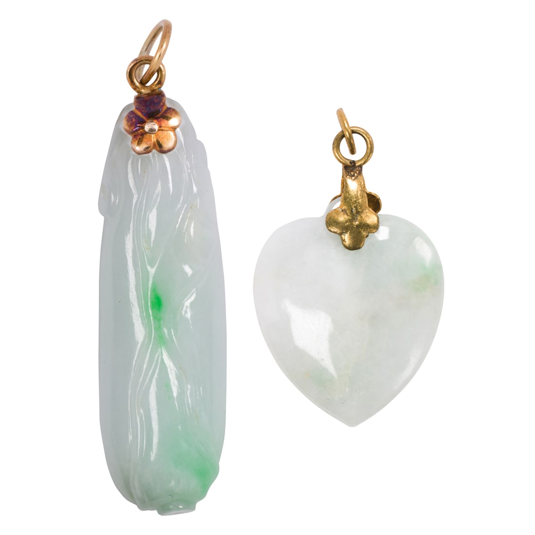 Two carved white jade pendants: Two carved white jade pendantsOne depicting a gourd, set on 10k gold bail, one depicting a heart; lengths: 1 3/4 and 1 1/8 in, respectively; gross weight: 11.15 grams