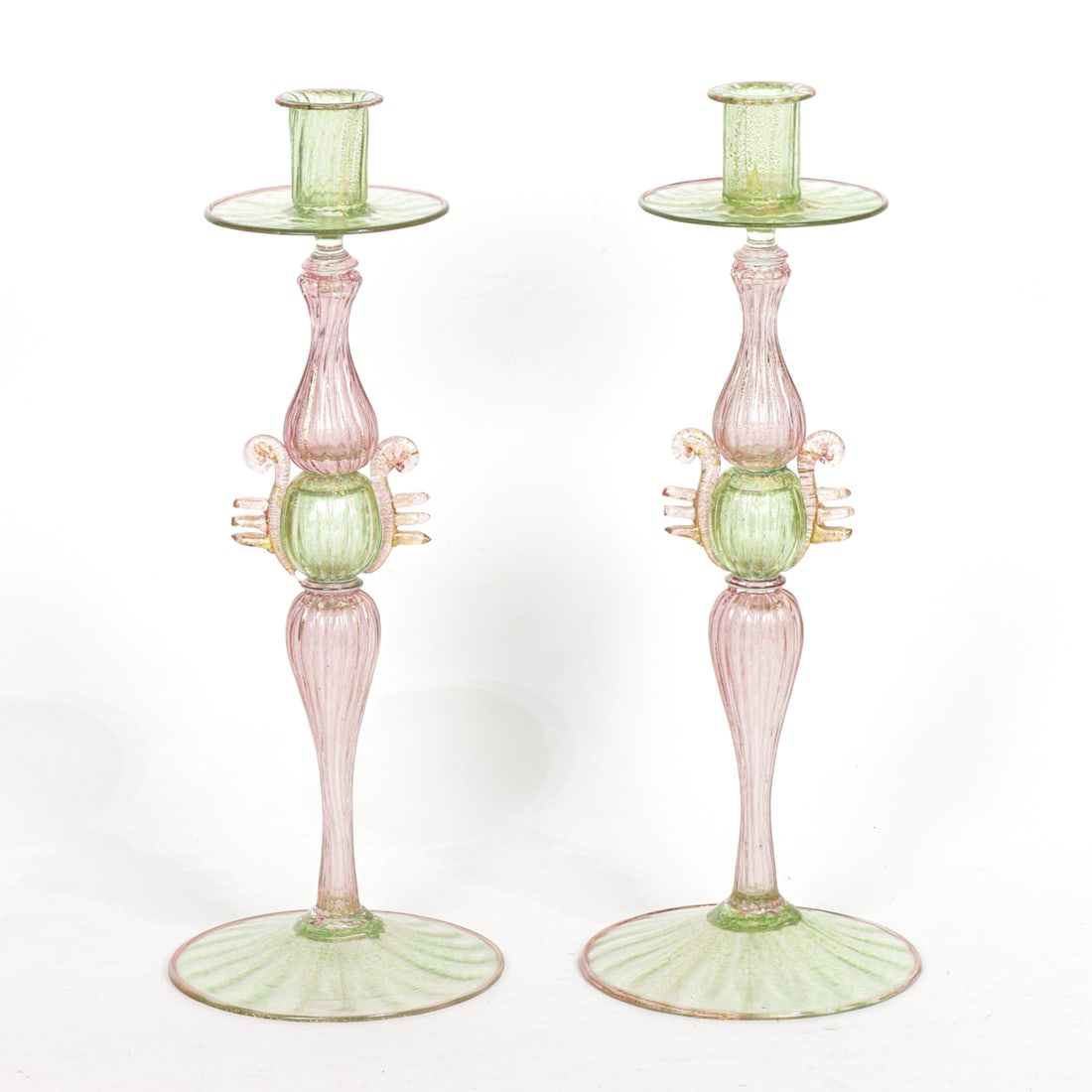 A pair of Venetian gold flecked pink and green glass candlesticks (1 of 1)