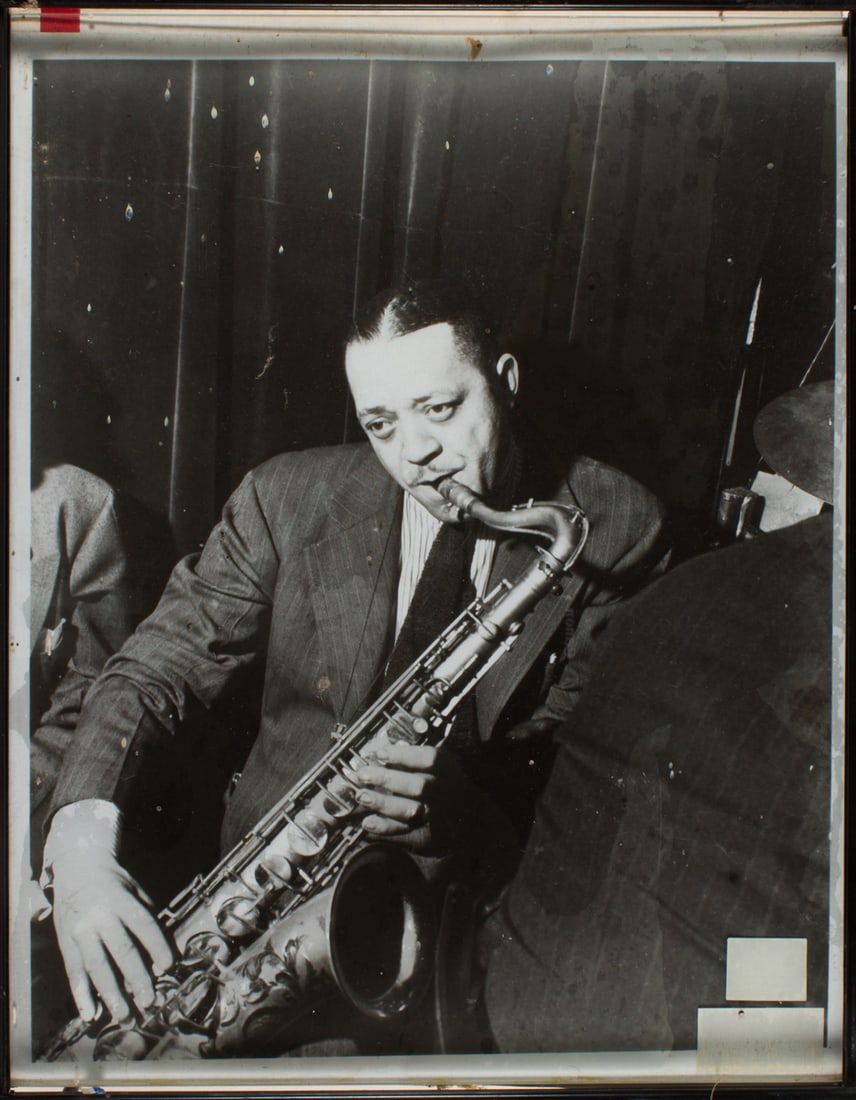 Two photos of jazz artist Lester Young, framed: Two photos of jazz artist Lester Young, framed. The signed one most likely a facsimile. Provenance: Property from an important Bay Area jazz collection. Framed dimensions 12.25" h x 9.25" w and 17" h