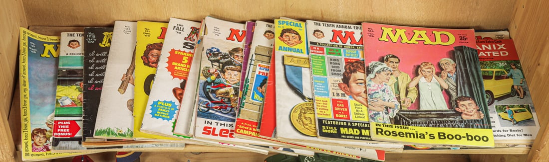A group of vintage MAD magazines with others: A group of vintage MAD magazines with others, comprising (17) MAD magazines with (4) others including Bettle Bailey, Hot Rod Cartoons and Mechanix Illustrated [21 total]. Provenance: The Collection