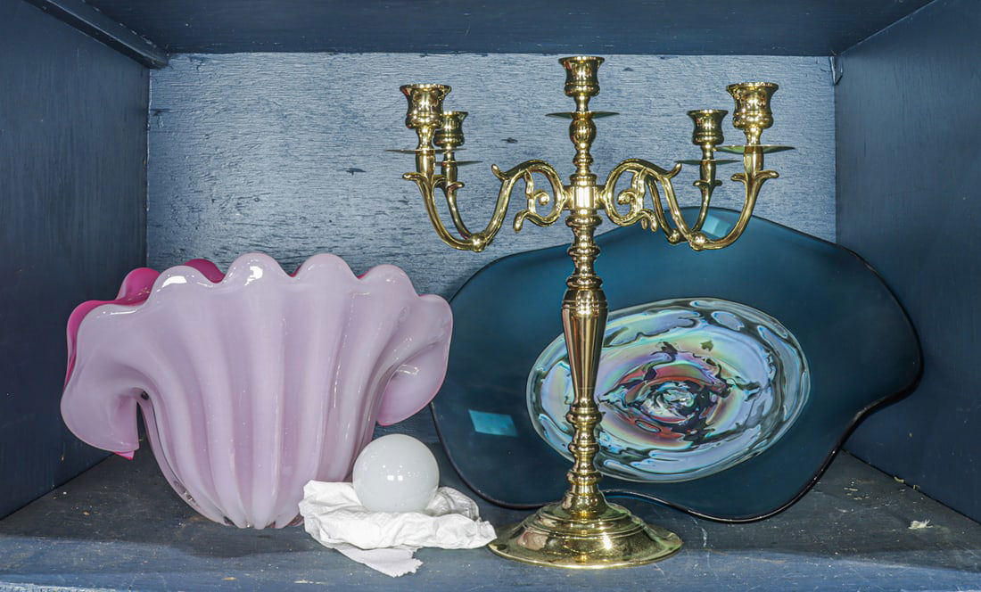 An assembled group: An assembled group, comprising Italian glass bowl; Studio glass dish; Baldwin brass five-light candelabrum, 14.25"h and an orb [4 total]