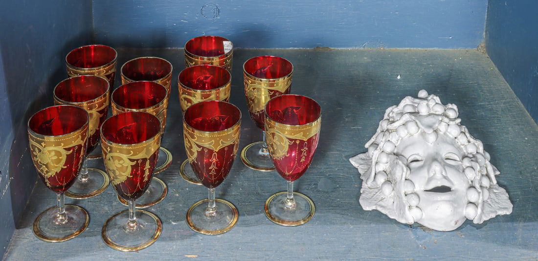 A set of eleven Continental gilt decorated ruby and clear glass goblets (1 of 1)