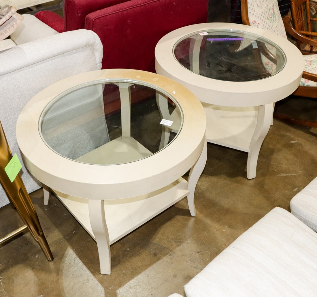 A group of two white painted glass top round tables with medial shelf (1 of 1)