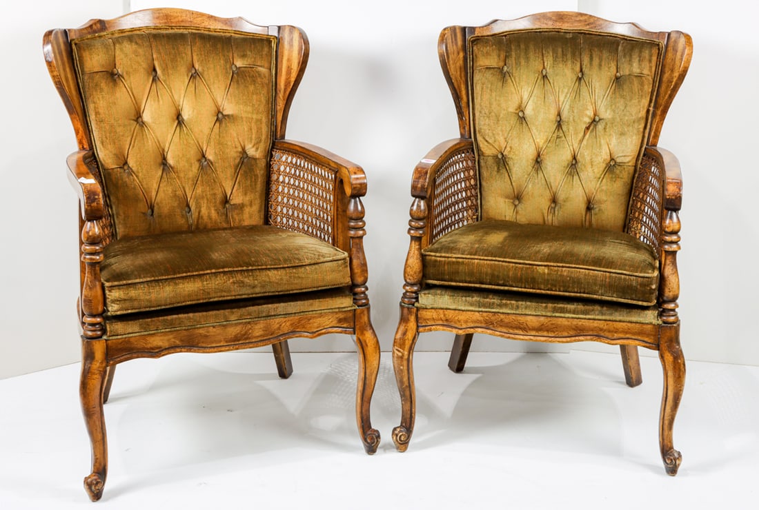 A pair of vintage armchairs with caned arms and tufted upholstery (1 of 1)