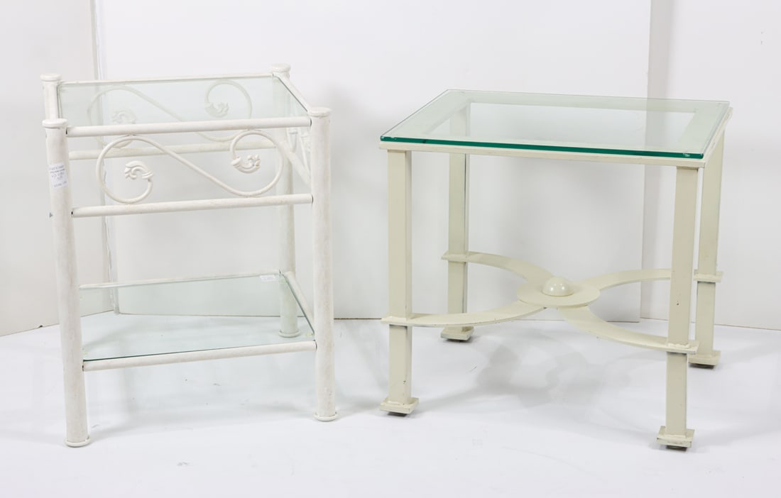 An outdoor table group: An outdoor table group, including a contemporary example, and a traditional example, both painted metal and glass, 23"h x 24"w x 20'd and 25"h x 20" square