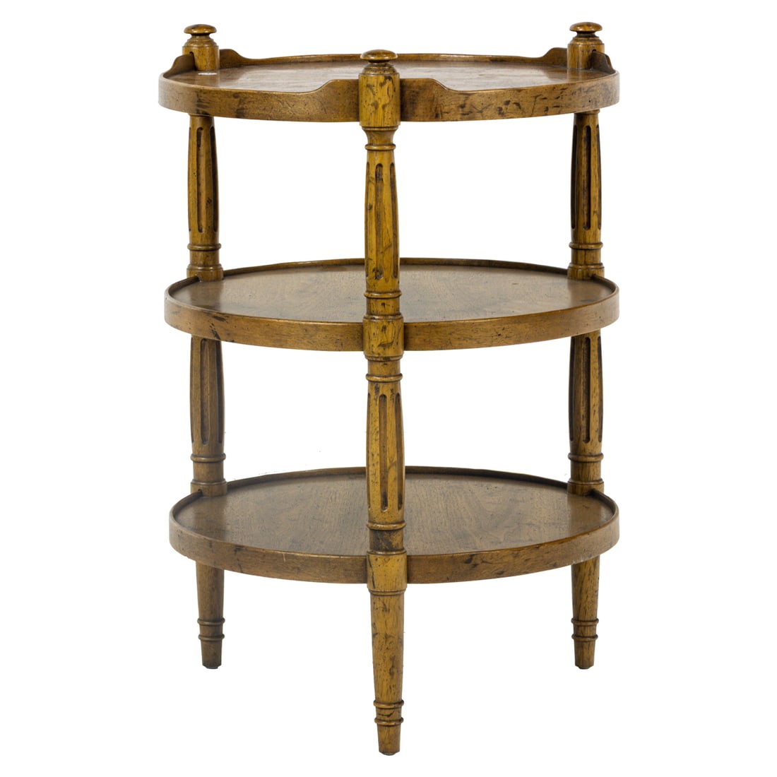 A Heritage round three-tier table: A Heritage round three-tier table, third quarter 20th century, stenciled 'HERITAGE 005-505, 6-68', 26.5"h x 18.5"w. Provenance: The Collection of Adolphus Andrews Jr. and Emily Taylor Andrews, San Fra