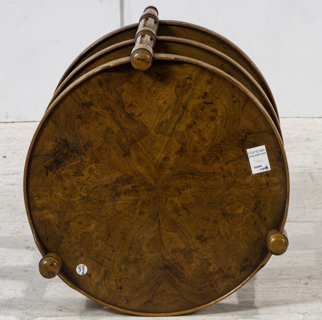 A Heritage round three-tier table - 3