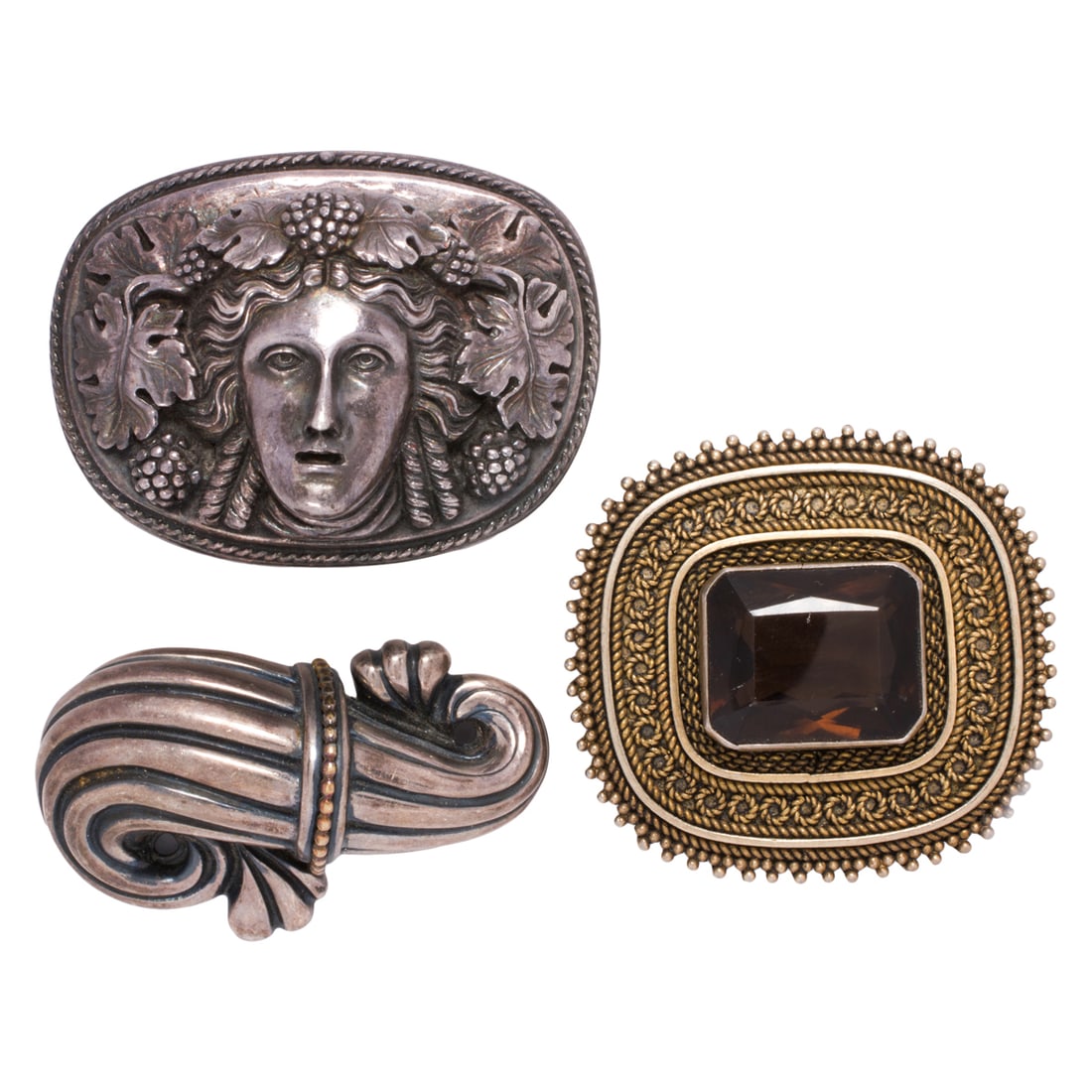 Three silver brooches including Henryk Winograd: Three silver brooches including Henryk WinogradComprising three brooches of varying styles and sizes; gross weight: 76.00 grams