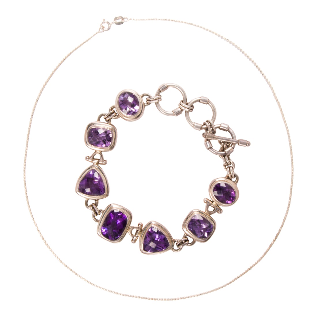 A group of silver jewelry: A group of silver jewelryComprising an amethyst and silver bracelet and a silver bead link chain; bracelet length: 8 3/4 in; chain length: 16 in; gross weight: 44.20 grams