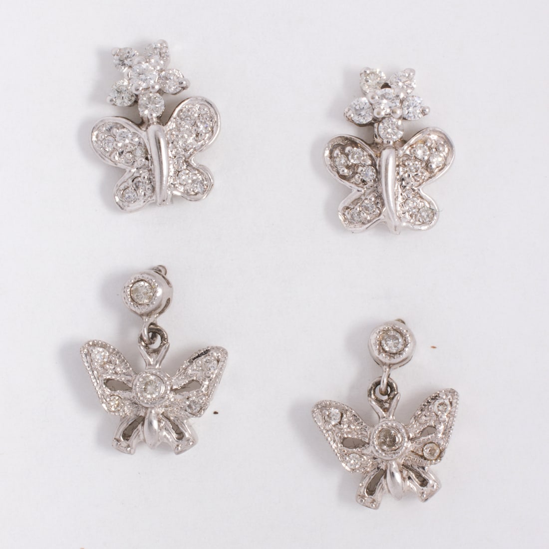 Two pairs of diamond and 14k white gold butterfly earrings (1 of 1)