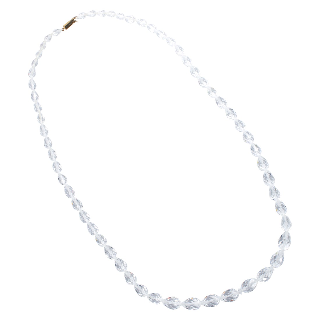 A group of faceted crystal beads: A group of faceted crystal beadsComprising approximately 58 faceted crystal beads of various sizes strung on white nylon thread; 95.77 grams; length: 30 in, approximately (strand broken)