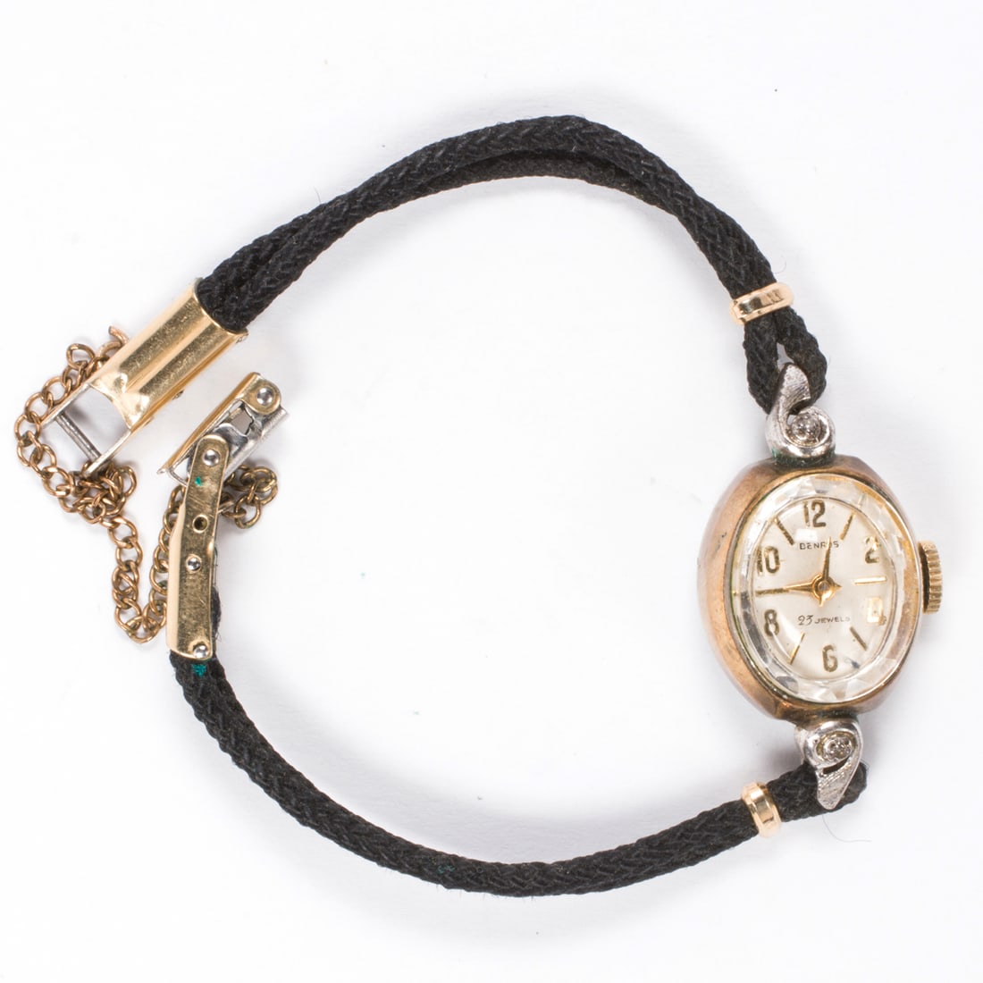 A gold-filled and stainless steel Benrus cocktail watch: A gold-filled and stainless steel Benrus cocktail watchCase no.: 6423Model no.: GM4B3The champagne-tone face, gold-tone mixed indices, gold-tone stick hands, within stainless steel case with gold-fill