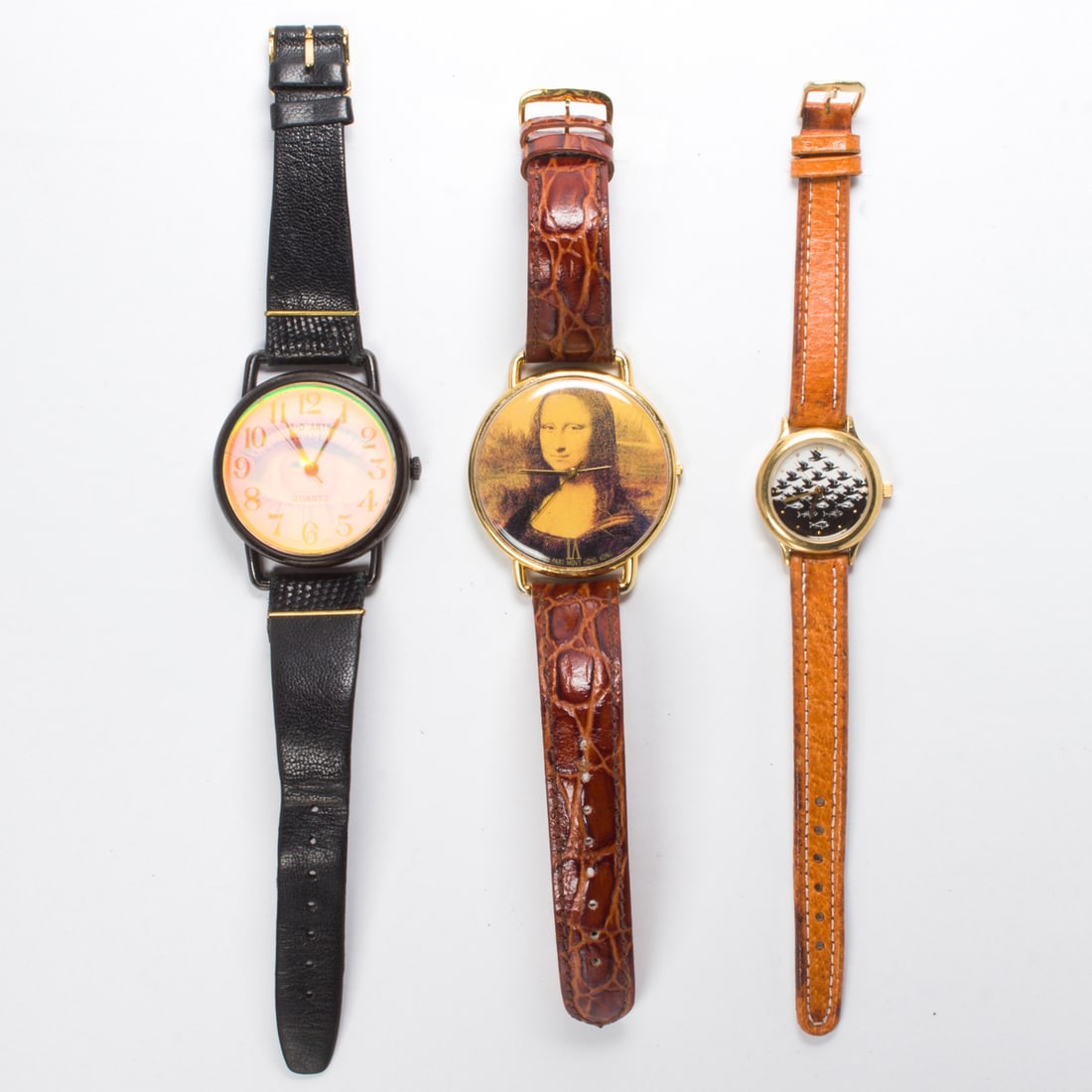 A group of three novelty watches: A group of three novelty watchesA group of three watches of varying styles and designs; gross grams 114.80 approximately
