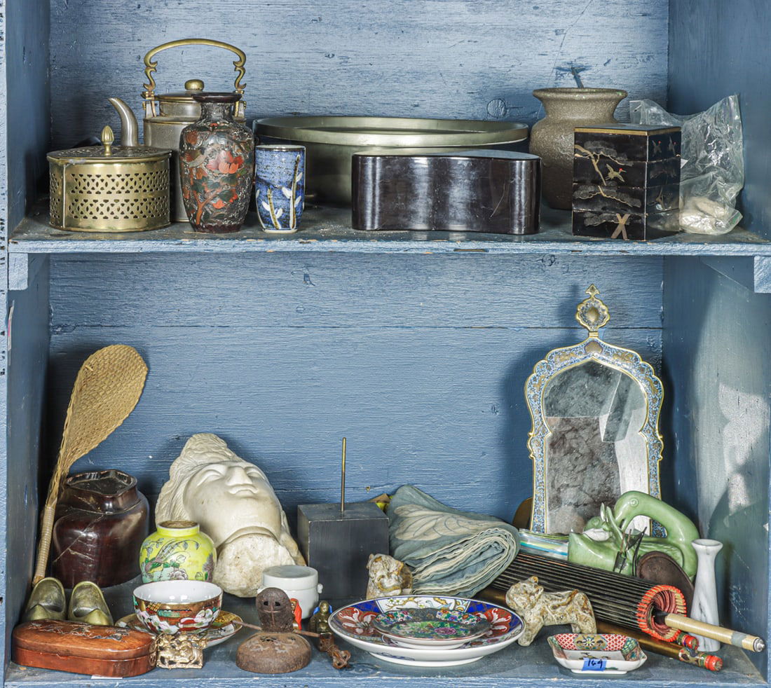 Two bins of Asian decorative objects: Two bins of Asian decorative objects. 20th century, 24" longest.