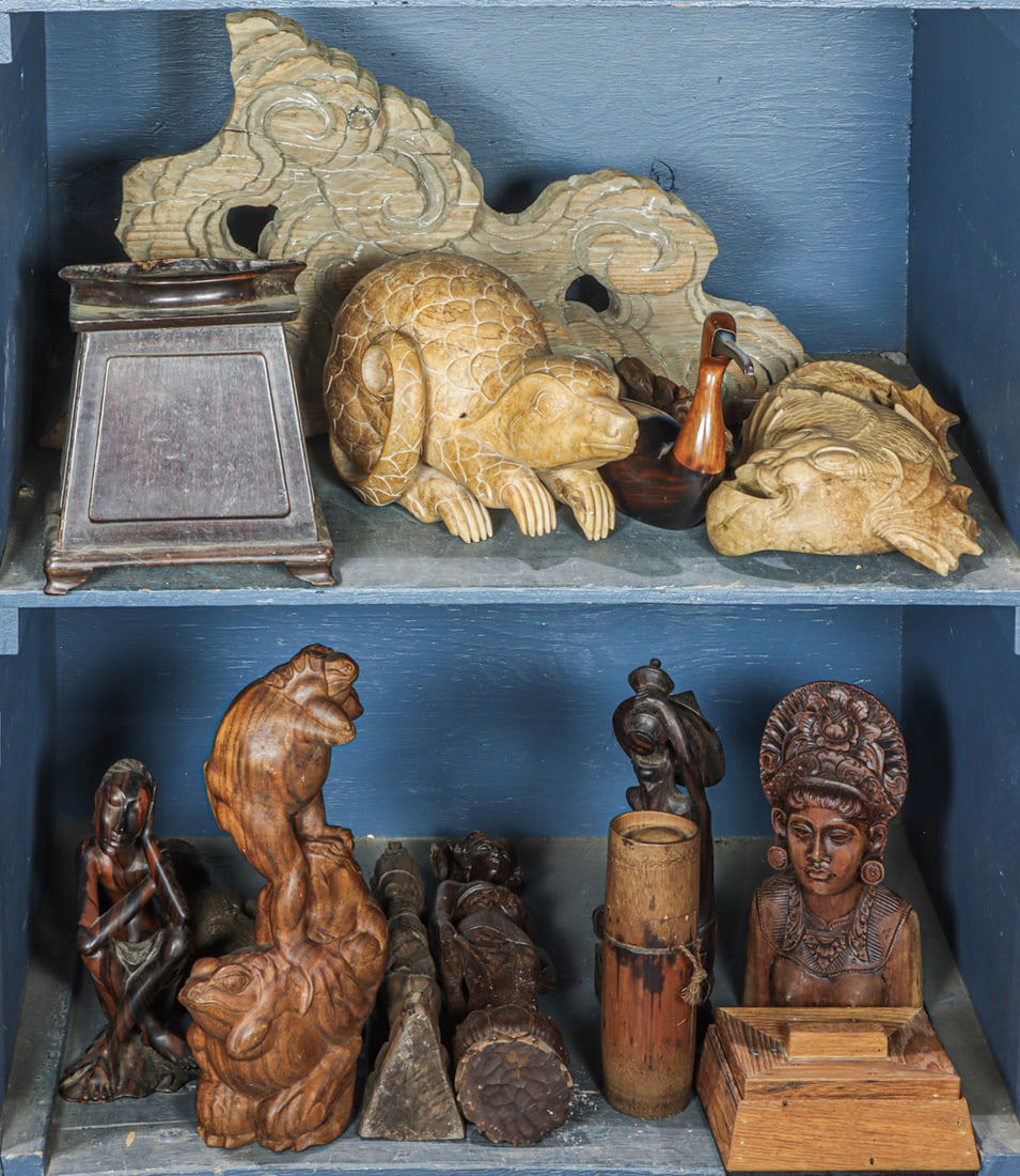Two bins of Asian wood carvings: Two bins of Asian wood carvings. 20th century, 24" widest.