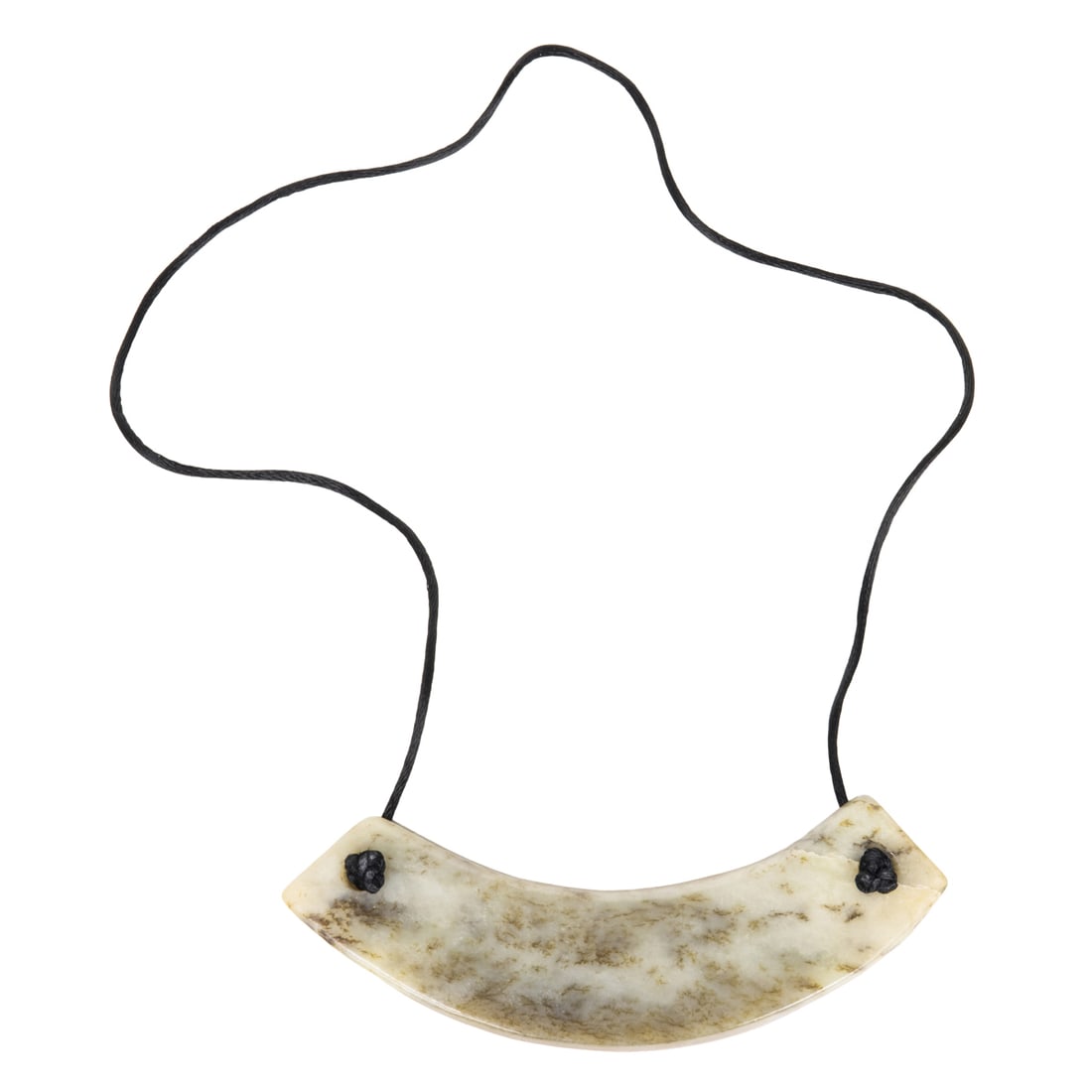 A Chinese jade huang: A Chinese jade huang. The arched pendant with two drilled holes, 5" across.