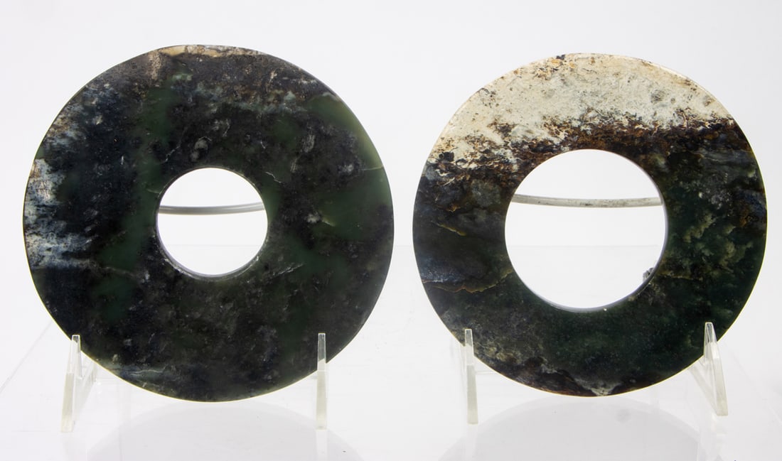 (lot of 2) Chinese spinach jade bi discs: (lot of 2) Chinese spinach jade bi discs. 20th century, 5.5" across.