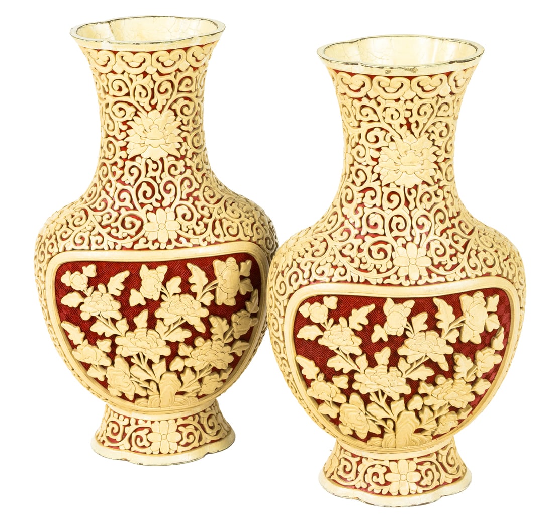 A pair of Chinese white on cinnabar lacquer vases: A pair of Chinese white on cinnabar lacquer vases. Featuring lotus and ruyi-head design, Republic period, 10.625" high.