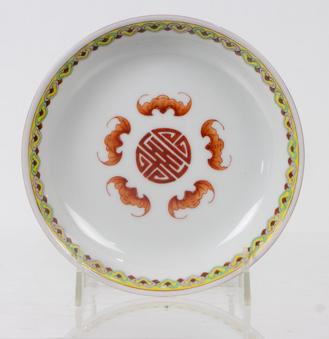 A Chinese falangcai enameled dish: A Chinese falangcai enameled dish. Depicting floral design, and auspicious motif, 6.25" across.