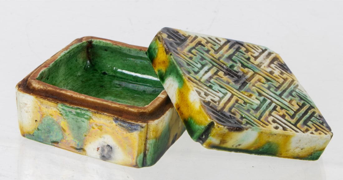 A Chinese sancai glazed square form box: A Chinese sancai glazed square form box. Kangxi period, 2.375" wide.