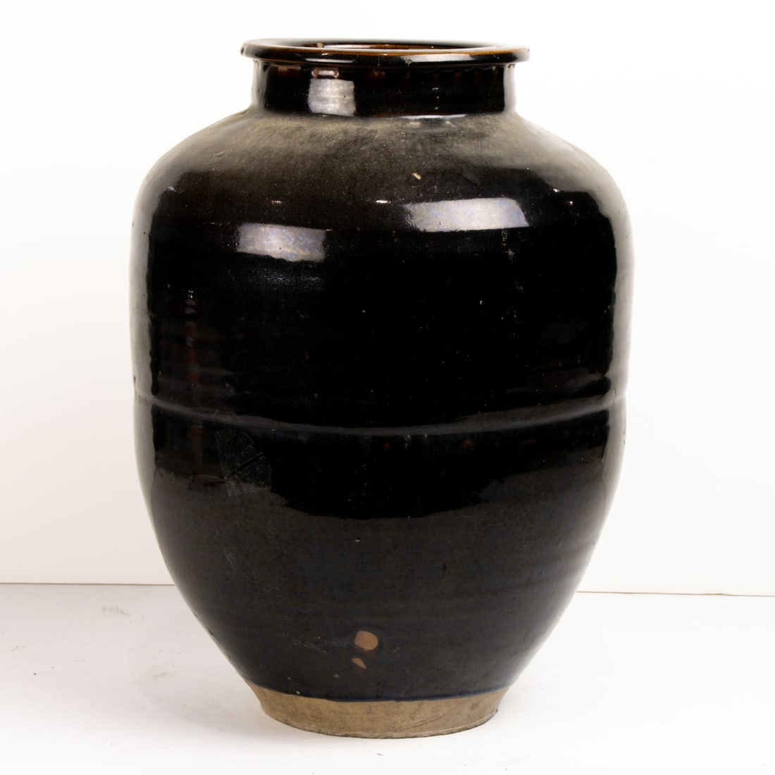 A Japanese Black Glazed Ceramic Jar (1 of 1)
