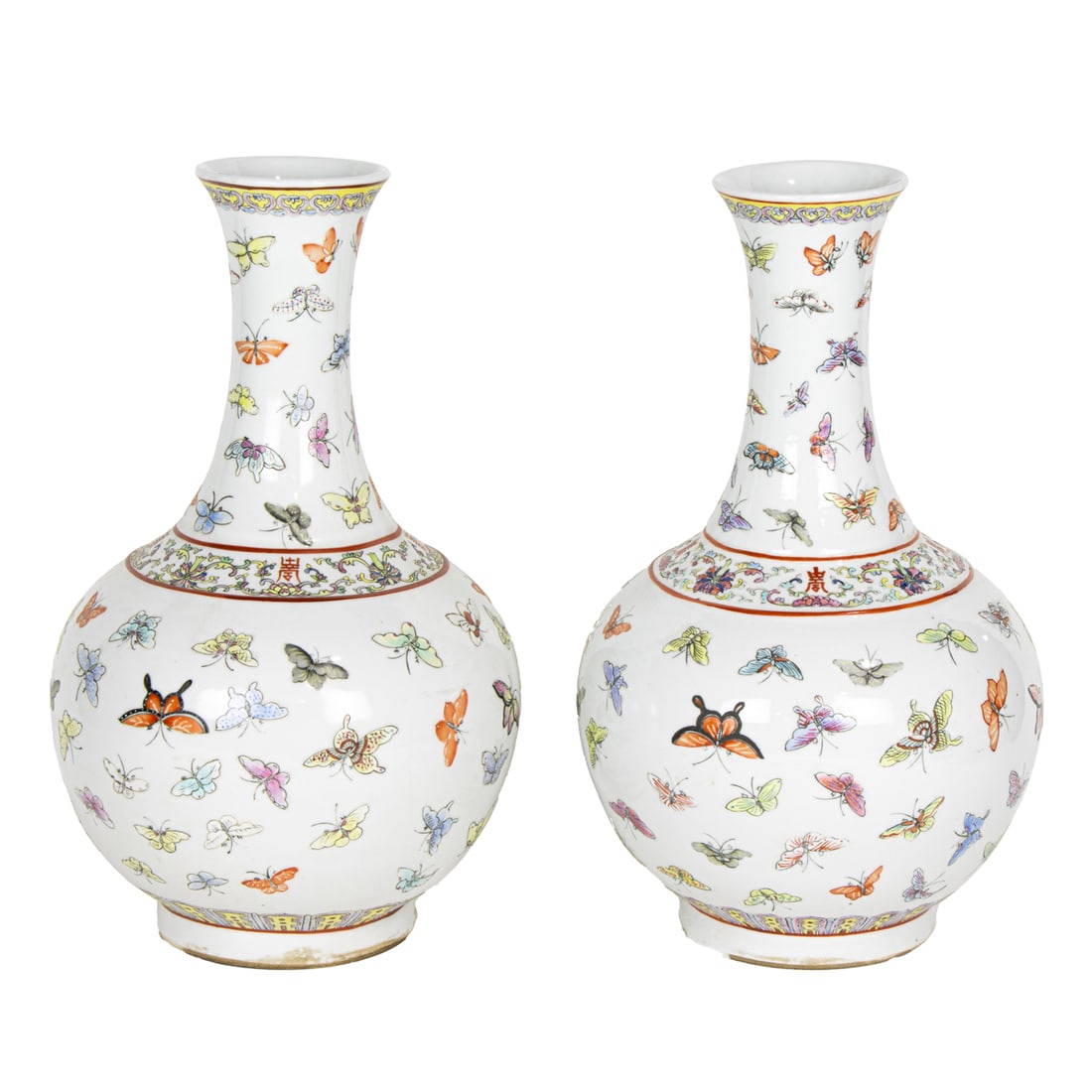 A pair of Chinese famille rose butterfly vases: A pair of Chinese famille rose butterfly vases. Bearing Tongzhi four-character mark, Republic period, 16.125" high.
