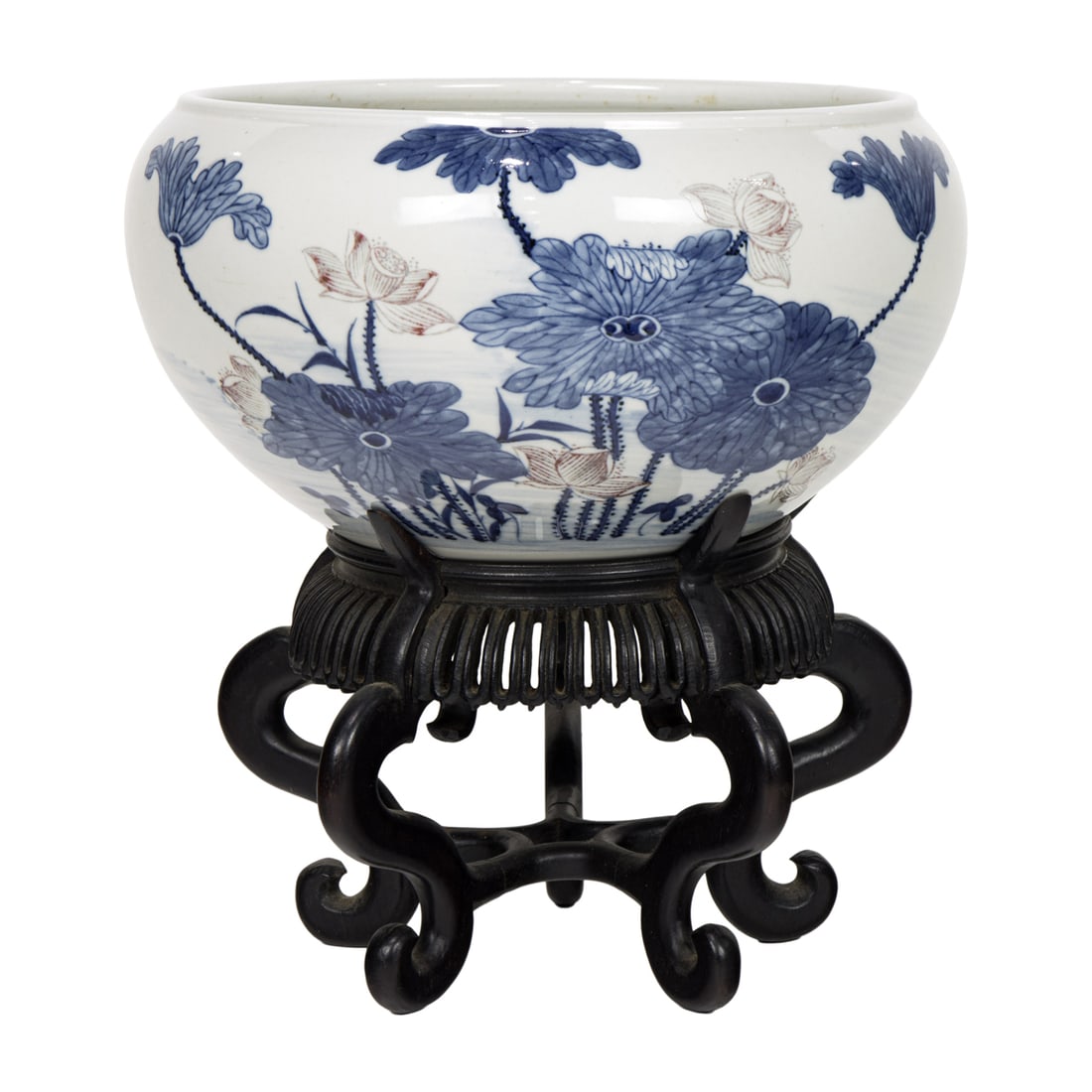 A Chinese blue, white and copper red globular pot and wood stand: A Chinese blue, white and copper red globular pot and wood stand. 20th century, 10" wide.