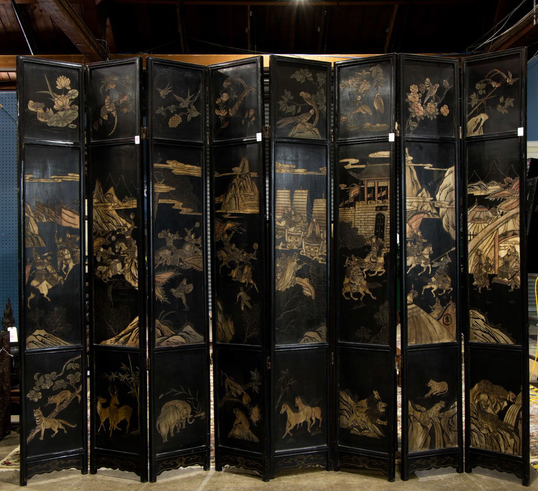 A Chinese eight-panel black lacquer coromandel 'warrior' folding screen (1 of 1)