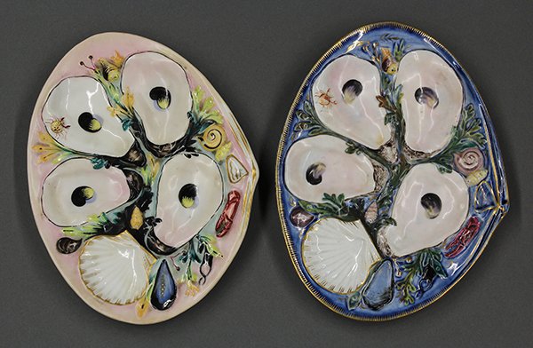 Union Porcelain Works (UPW) oyster plates, 19th century: (lot of 2) Union Porcelain Works (UPW) oyster plates, 19th century. Shell form plates with bas relief seaweed shells and crabs. Hand painted with gilt rims and four wells. 5.75"h x 8"w.
