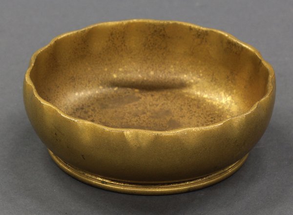 Tiffany Studios, New York, dore bronze low bowl: Tiffany Studios, New York, dore bronze low bowl, the scalloped rim surmounting the squat form continuing to the circular foot, and marked Tiffany Studios New York 1719 on base, 1.5"h x 4.5"w. Provenan