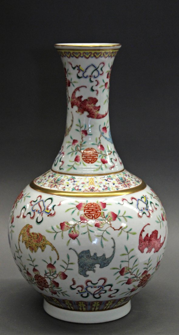 Chinese Stick Neck Vase, Bats: Chinese enameled stick neck porcelain vase, the neck and the globular body decorated with bats in hues of pink, blue and yellow soaring amid shou medallion and peach sprigs and ribbon tied antiquties,