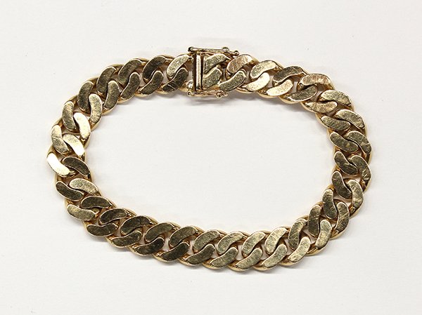 Fourteen karat yellow gold curb link bracelet