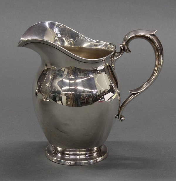 Black, Starr, & Frost sterling silver pitcher: Black, Starr, & Frost sterling silver pitcher resting on a circular base, the vessel holds 3.5 pints, 8'h, 16.19 troy oz. Provenance: Private collection Monterey, California. Descended through family;