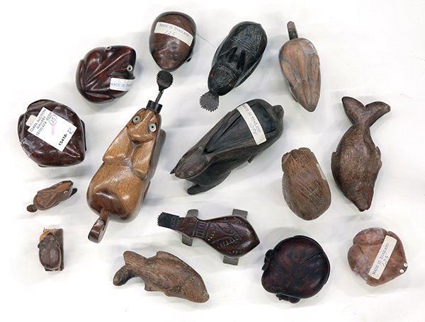 Asian Wood Boxes, Coconut Graters, Figures: (lot of 15) Group of Southeast Asian wooden items, mostly from Thailand, eight wooden boxes of frog and rabbit shape; one beetle and two rabbit shaped coconut graters; two fish figures, one bird and o
