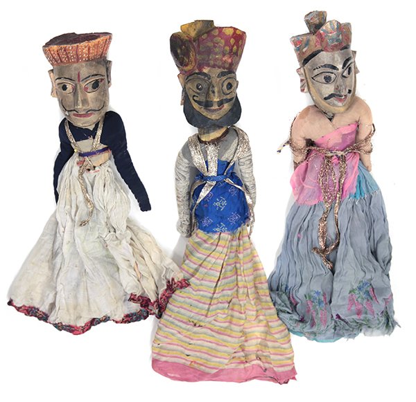 Indonesian Puppets, 20th Century: (lot of 3) Indonesian puppets, 20th century. Having carved wooden heads with polychrome painted headresses and faces. Dressed in cotton and silk sari fragments, largest 22"l.