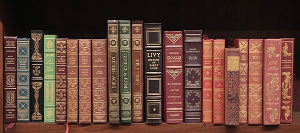 Books in leather bound by The Harvard Classics: (lot of 21) Books in leather bound by The Harvard Classics, International Collectors Library, and National Geographic Society relating to history and literature including Tales of Edgar Allan Poe, The
