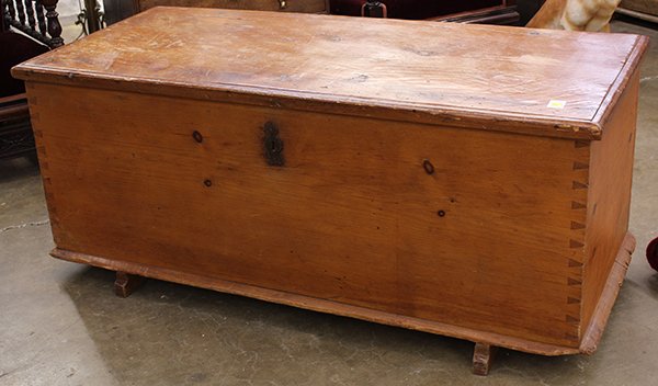 American primitive six board blanket chest: American primitive six board blanket chest, 18th century, retains the original wrought strap hinges, the six boards with mortise and tenon construction and rising on later rails, 24"h x 58"w x 25"d