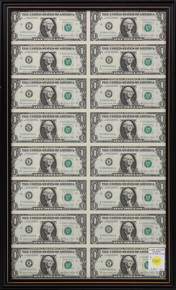 (lot of 2) Framed currency: (lot of 2) Framed currency, consisting of 16 uncut $2 (Two Dollar) bills, Series 1976, together with framed uncut $1 (One dollar) bills, 1981A, both framed in a partial gilt and ebonized molding