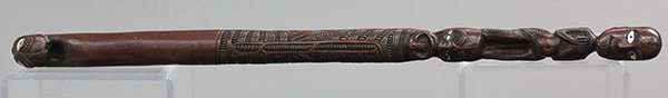 Maori people of New Zealand figural baton: Maori people of New Zealand figural baton depicting a standing figure and two heads plus much incising of tattoing motifs, dating to the 20th century, the revival period or later 22.25"h. Provenance: 