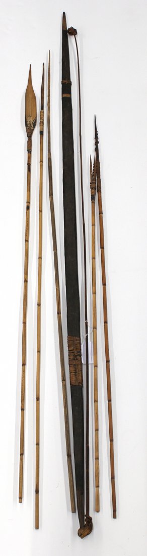 Tribal style weapons: (lot of 6) South Pacific style, mid 20th century, bow and arrows, consisting of one stringed bow and five arrows or spears, probably made for use, several with bindery on the bamboo shaft, tops with s