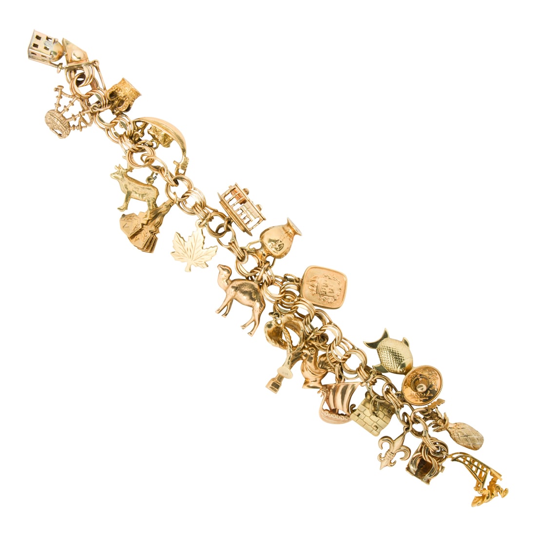 A gold charm bracelet: A gold charm braceletthe 14k gold bracelet suspending 21 travel-themed charms in 10k, 14k, and 18k gold, including an articulated fan, log cabin, bagpipes, and royal crown; length: 7 1/2 in; 54.40
